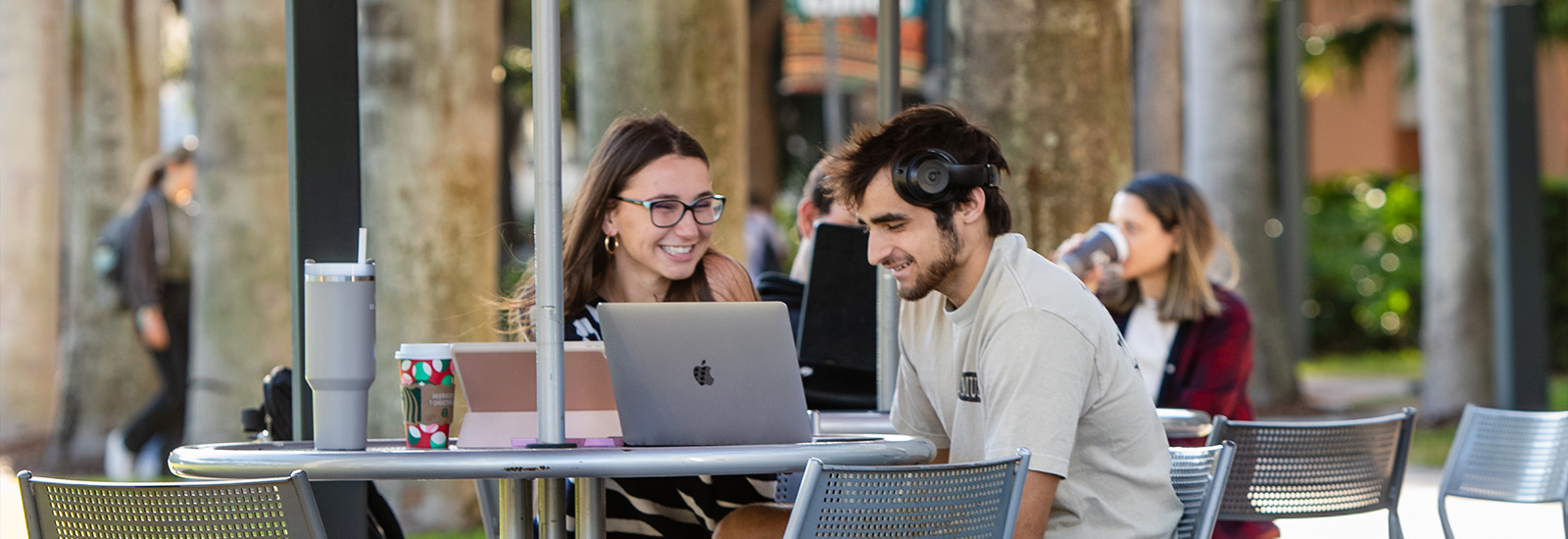 Two students sitting.